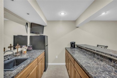 Nestled on a peaceful cul-de-sac, this delightful home is on Paola Country Club in Kansas - for sale on GolfHomes.com, golf home, golf lot