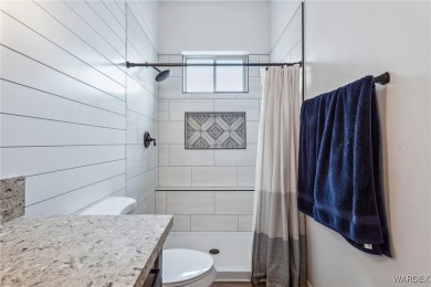 Welcome to this beautifully designed 2022 custom-built home on Desert Lakes Golf Course in Arizona - for sale on GolfHomes.com, golf home, golf lot