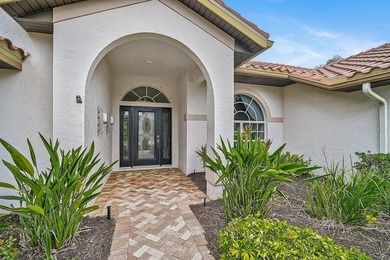 Gracefully positioned on a private homesite within the on Calusa Lakes Golf Club in Florida - for sale on GolfHomes.com, golf home, golf lot
