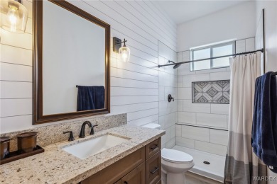 Welcome to this beautifully designed 2022 custom-built home on Desert Lakes Golf Course in Arizona - for sale on GolfHomes.com, golf home, golf lot