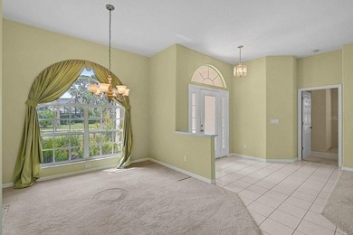 Gracefully positioned on a private homesite within the on Calusa Lakes Golf Club in Florida - for sale on GolfHomes.com, golf home, golf lot