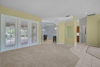 Gracefully positioned on a private homesite within the on Calusa Lakes Golf Club in Florida - for sale on GolfHomes.com, golf home, golf lot