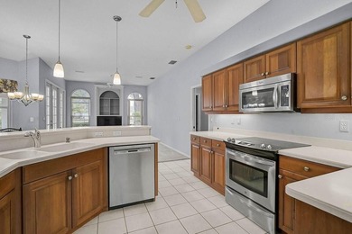 Gracefully positioned on a private homesite within the on Calusa Lakes Golf Club in Florida - for sale on GolfHomes.com, golf home, golf lot