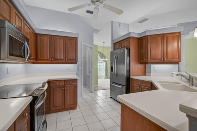 Gracefully positioned on a private homesite within the on Calusa Lakes Golf Club in Florida - for sale on GolfHomes.com, golf home, golf lot