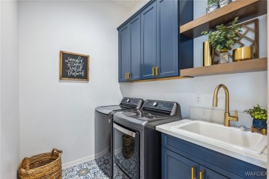 Welcome to this beautifully designed 2022 custom-built home on Desert Lakes Golf Course in Arizona - for sale on GolfHomes.com, golf home, golf lot