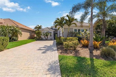 This beautifully enhanced WATER VIEW Augusta model set within on Rosedale Golf and Tennis Club in Florida - for sale on GolfHomes.com, golf home, golf lot