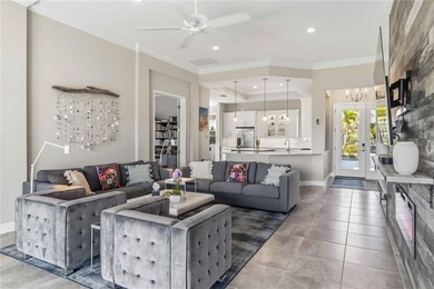 This beautifully enhanced WATER VIEW Augusta model set within on Rosedale Golf and Tennis Club in Florida - for sale on GolfHomes.com, golf home, golf lot