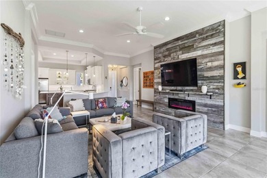 This beautifully enhanced WATER VIEW Augusta model set within on Rosedale Golf and Tennis Club in Florida - for sale on GolfHomes.com, golf home, golf lot