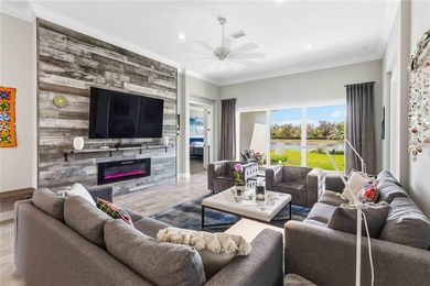 This beautifully enhanced WATER VIEW Augusta model set within on Rosedale Golf and Tennis Club in Florida - for sale on GolfHomes.com, golf home, golf lot