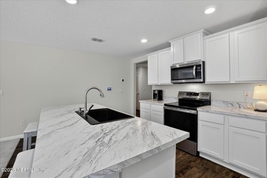 Move-In Ready & Available Now! Built in 2021, this beautifully on Grand Reserve Golf Course in Florida - for sale on GolfHomes.com, golf home, golf lot