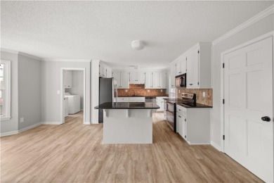 Updated: New Flooring, Newly Painted  Move-In Ready 3-Sides on Brookstone Golf and Country Club in Georgia - for sale on GolfHomes.com, golf home, golf lot