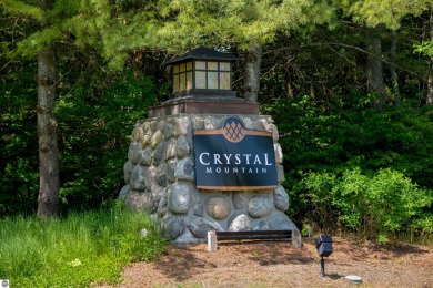 Condo at Crystal Mountain Resort! Golf in the summer, ski in the on Crystal Mountain Golf Course in Michigan - for sale on GolfHomes.com, golf home, golf lot
