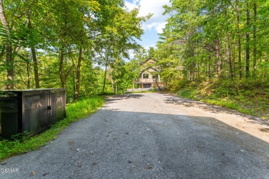 Experience refined mountain living in the prestigious Cobbly Nob on Bent Creek Golf Course in Tennessee - for sale on GolfHomes.com, golf home, golf lot