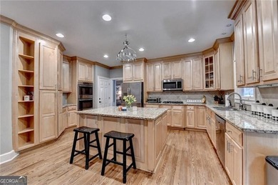 Stately 6-bedroom, 5-bath executive home built by award-winning on Woodmont Golf and Country Club in Georgia - for sale on GolfHomes.com, golf home, golf lot