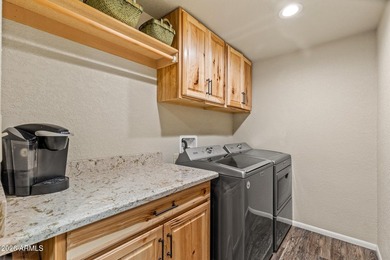 Tucked away on a rare 1/3+ acre homesite backing the dramatic on Pinewood Country Club in Arizona - for sale on GolfHomes.com, golf home, golf lot