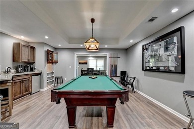 Stately 6-bedroom, 5-bath executive home built by award-winning on Woodmont Golf and Country Club in Georgia - for sale on GolfHomes.com, golf home, golf lot