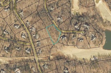 Nestled within the serene and exclusive Big Canoe community in on Big Canoe Golf Club - Cherokee in Georgia - for sale on GolfHomes.com, golf home, golf lot