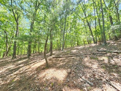 Nestled within the serene and exclusive Big Canoe community in on Big Canoe Golf Club - Cherokee in Georgia - for sale on GolfHomes.com, golf home, golf lot