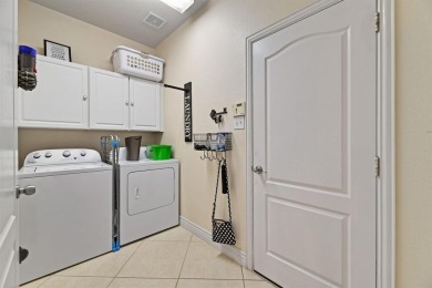 Huge 3-CAR GARAGE for protecting all your vehicles from on Lantana Golf Club in Texas - for sale on GolfHomes.com, golf home, golf lot