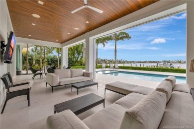 An exceptional waterfront residence in Sailfish Point, built in on Sailfish Point Golf Club, Inc. in Florida - for sale on GolfHomes.com, golf home, golf lot