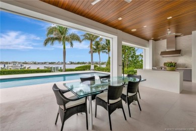 An exceptional waterfront residence in Sailfish Point, built in on Sailfish Point Golf Club, Inc. in Florida - for sale on GolfHomes.com, golf home, golf lot