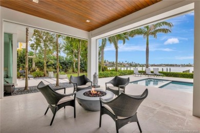 An exceptional waterfront residence in Sailfish Point, built in on Sailfish Point Golf Club, Inc. in Florida - for sale on GolfHomes.com, golf home, golf lot