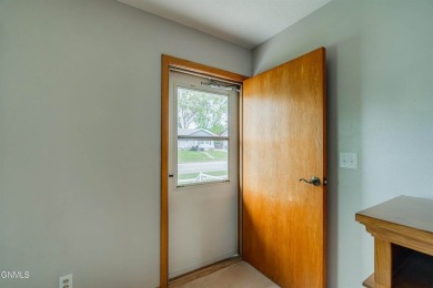 Rare, one-owner home in a fantastic neighborhood close to the on Tom O Leary Golf Course in North Dakota - for sale on GolfHomes.com, golf home, golf lot