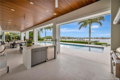 An exceptional waterfront residence in Sailfish Point, built in on Sailfish Point Golf Club, Inc. in Florida - for sale on GolfHomes.com, golf home, golf lot