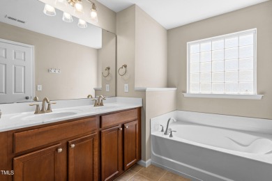Welcome to 517 Hammond Oak Lane, a beautifully updated 3-bedroom on Heritage Golf Club in North Carolina - for sale on GolfHomes.com, golf home, golf lot