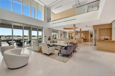 An exceptional waterfront residence in Sailfish Point, built in on Sailfish Point Golf Club, Inc. in Florida - for sale on GolfHomes.com, golf home, golf lot