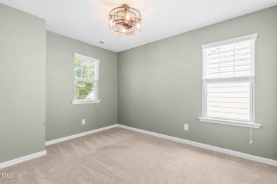 Welcome to 517 Hammond Oak Lane, a beautifully updated 3-bedroom on Heritage Golf Club in North Carolina - for sale on GolfHomes.com, golf home, golf lot