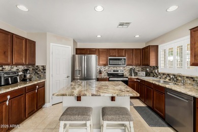 Welcome home to this stunning two-story gem, on a quiet on The Golf Club At Johnson Ranch in Arizona - for sale on GolfHomes.com, golf home, golf lot