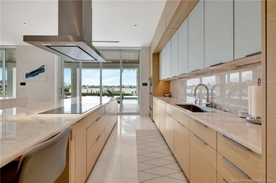 An exceptional waterfront residence in Sailfish Point, built in on Sailfish Point Golf Club, Inc. in Florida - for sale on GolfHomes.com, golf home, golf lot