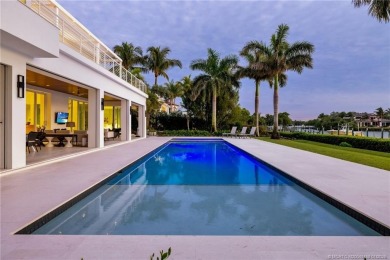 An exceptional waterfront residence in Sailfish Point, built in on Sailfish Point Golf Club, Inc. in Florida - for sale on GolfHomes.com, golf home, golf lot