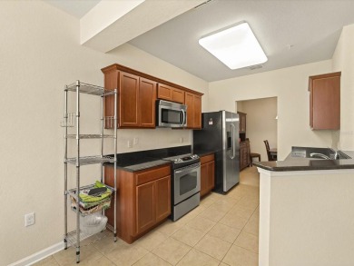 Step into effortless living with this fully furnished condo in on ChampionsGate Golf Resort in Florida - for sale on GolfHomes.com, golf home, golf lot