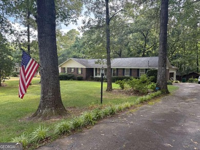 This 4 bedroom, 3 bath ranch has perfect bones and a great floor on Cherokee Golf and Country Club in Georgia - for sale on GolfHomes.com, golf home, golf lot