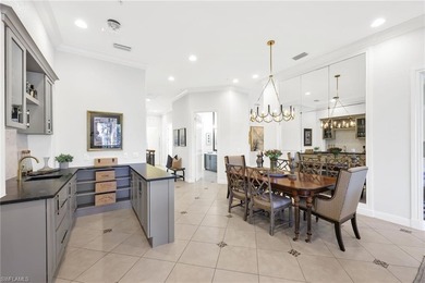 Experience resort-style living in this impeccably updated on The Rookery At Marco in Florida - for sale on GolfHomes.com, golf home, golf lot