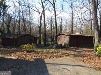 This 4 bedroom, 3 bath ranch has perfect bones and a great floor on Cherokee Golf and Country Club in Georgia - for sale on GolfHomes.com, golf home, golf lot
