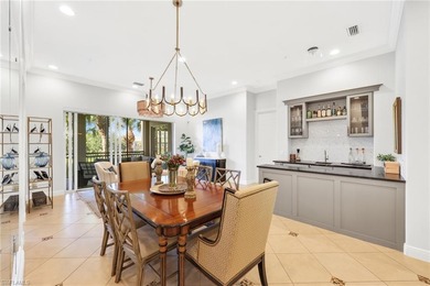 Experience resort-style living in this impeccably updated on The Rookery At Marco in Florida - for sale on GolfHomes.com, golf home, golf lot