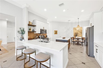 Experience resort-style living in this impeccably updated on The Rookery At Marco in Florida - for sale on GolfHomes.com, golf home, golf lot