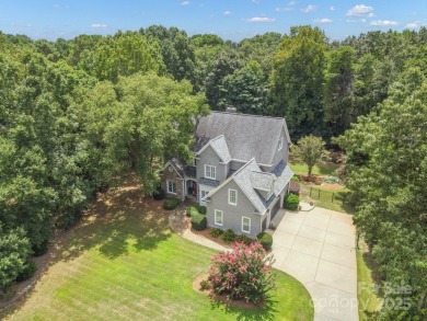 Live the ultimate lifestyle in this stunning home w/deeded boat on Trump National Golf Club Charlotte in North Carolina - for sale on GolfHomes.com, golf home, golf lot