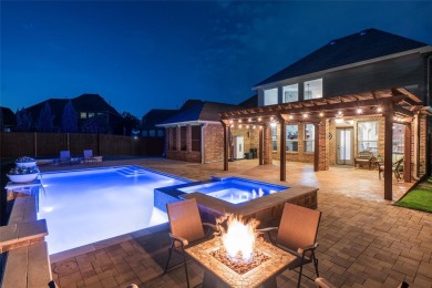 Stunning Lennar home with oversized backyard featuring a pergola on Trophy Club of Dallas - Whitworth in Texas - for sale on GolfHomes.com, golf home, golf lot