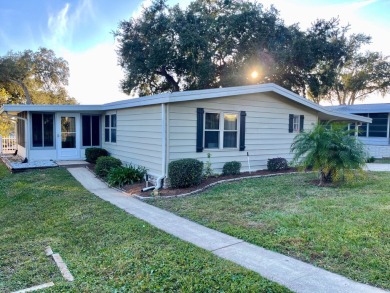 Motivated Seller! This home has been painted inside and totally on Water Oak Country Club Estates in Florida - for sale on GolfHomes.com, golf home, golf lot