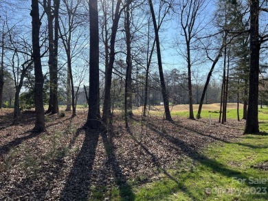 Exceptional value! This wooded lot is located on the 4th fairway on Old North State Club in North Carolina - for sale on GolfHomes.com, golf home, golf lot