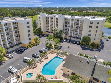 Here is your LOVELY LUXURY LAKEFRONT CORNER CONDO with beautiful on East Bay Golf Club in Florida - for sale on GolfHomes.com, golf home, golf lot