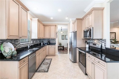 This beautiful, well-maintained, top floor, end unit condo in on River Hall Country Club in Florida - for sale on GolfHomes.com, golf home, golf lot