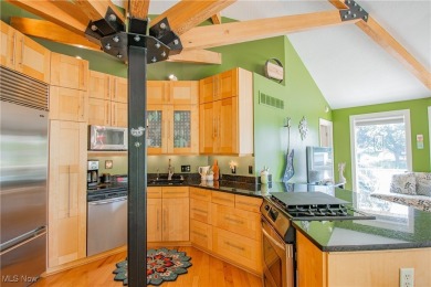 Paradise found! This one-of-a-kind, custom-built octagon-shaped on Turkeyfoot Lake Golf Links in Ohio - for sale on GolfHomes.com, golf home, golf lot