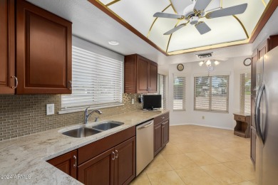 Location!  Lovely end unit with view of golf course and minutes on Fountain of the Sun Country Club in Arizona - for sale on GolfHomes.com, golf home, golf lot