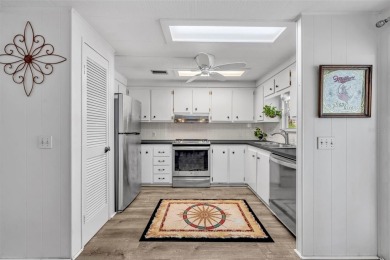 Not far from the busyness and excitement of Metro Orlando and on Zellwood Station Country Club in Florida - for sale on GolfHomes.com, golf home, golf lot