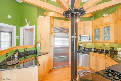 Paradise found! This one-of-a-kind, custom-built octagon-shaped on Turkeyfoot Lake Golf Links in Ohio - for sale on GolfHomes.com, golf home, golf lot